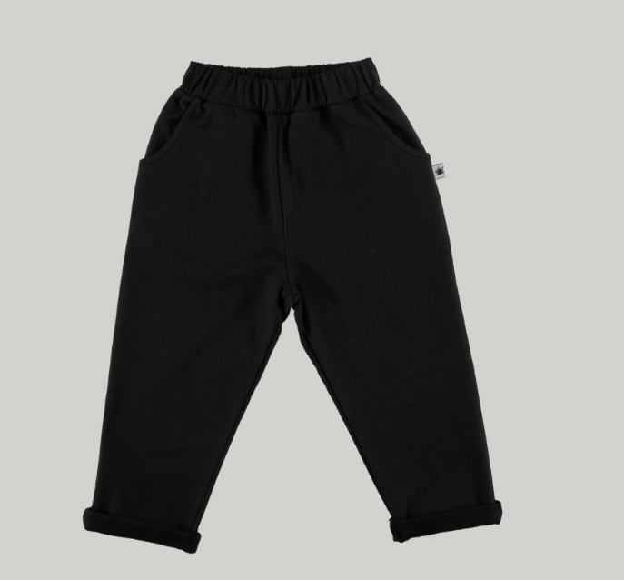 Black pants on a light gray background